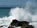 picture of surf crashing into a rock at Puerto Valarta