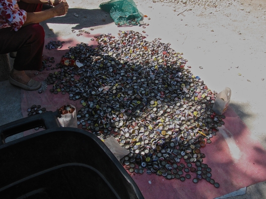 So what do you do with hundreds of used beer-bottle caps?