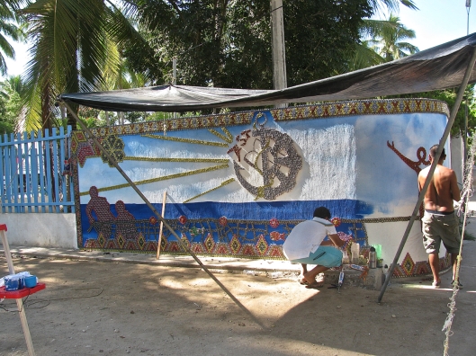The mural in progress